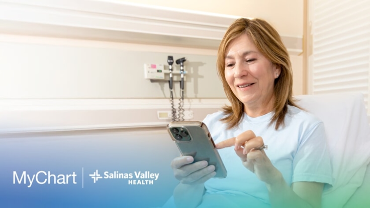 Woman using MyChart on phone